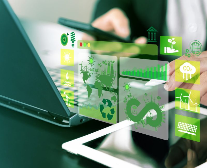 Businessman analyze sustainability investment with icons and Green chart. Concept of ESG, Green businesses, Net zero, Green energy, Carbon neutral, Green technology, and Carbon credit. CSR.